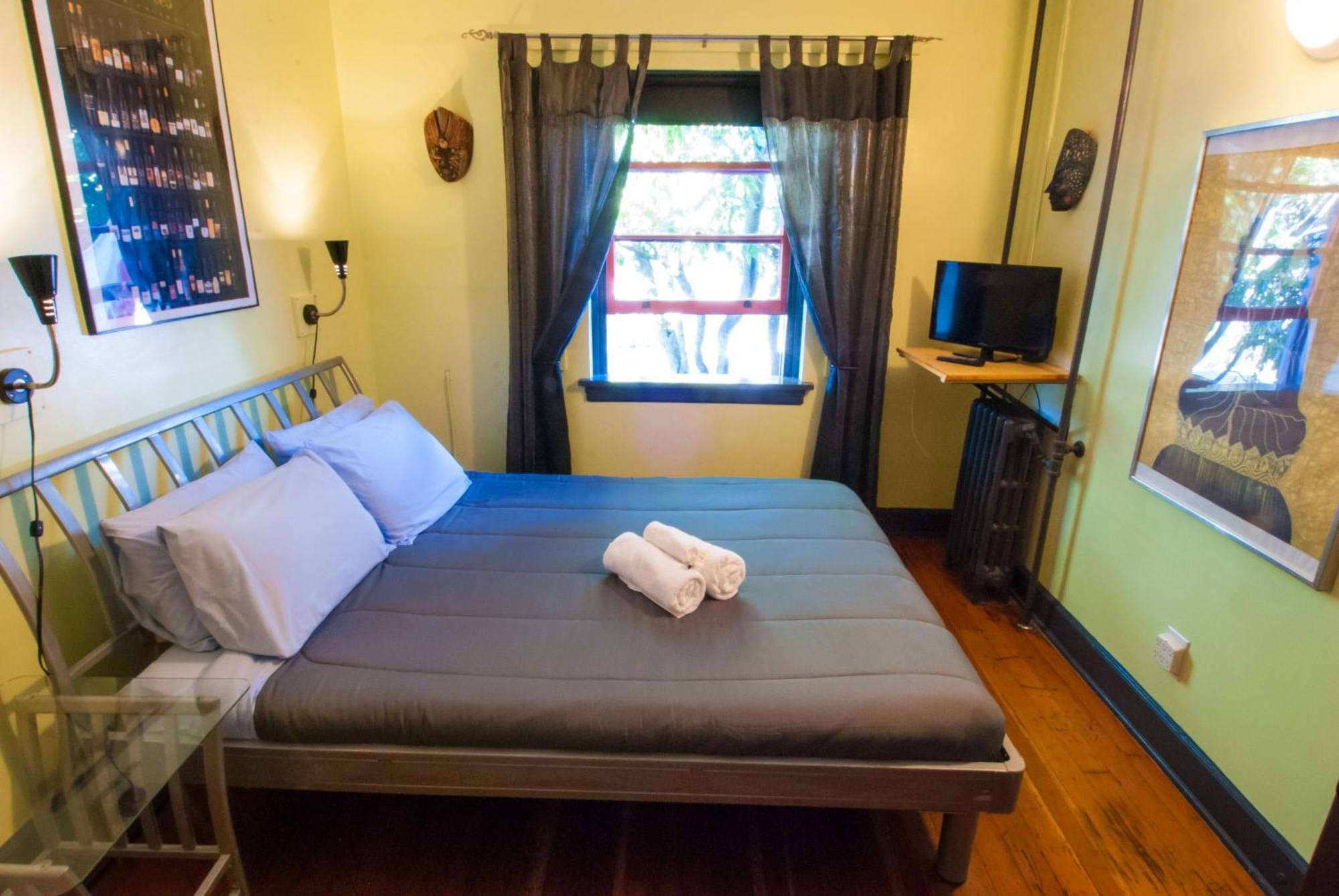 Ocean Island Inn | Backpackers | Suites Victoria Habitación foto